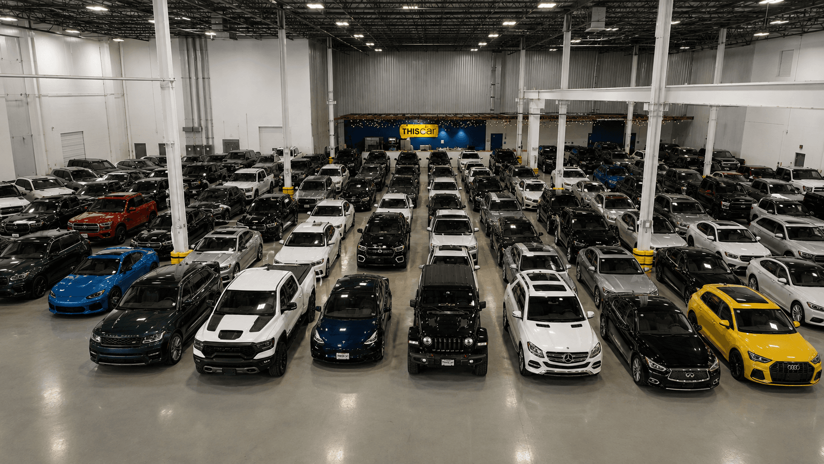 Large selection of consumer-sourced vehicles inside the THIScar warehouse